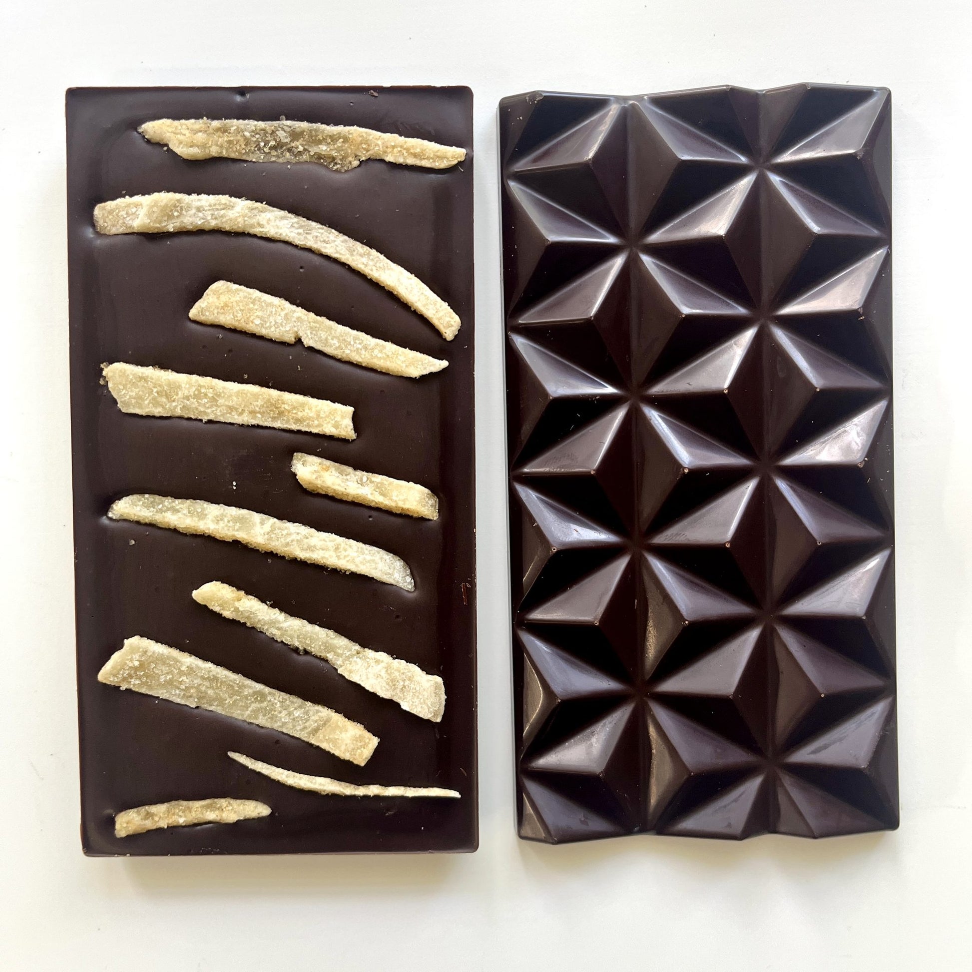 Front and back of a Ginger Palenque 70% bar with long strips of crystallized ginger