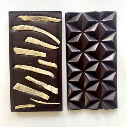 Front and back of a Ginger Palenque 70% bar with long strips of crystallized ginger