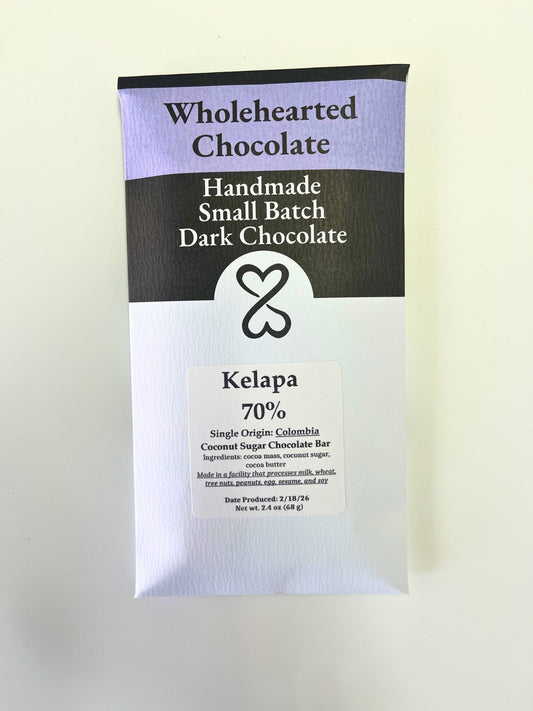 Wholehearted Chocolate Kelapa 70% Coconut Sugar dark chocolate bar packaging on a light background