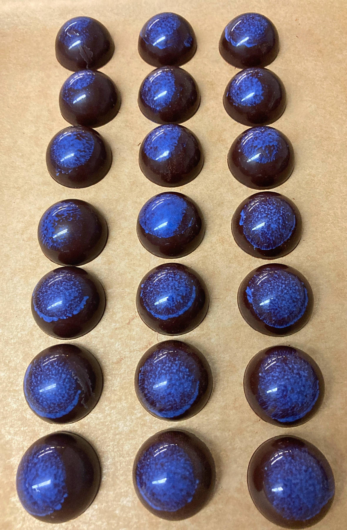 hemisphere chocolate truffles with blue color on top